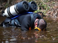Police divers search a dam near Bonny Hills in March 2015. Picture: Dan Himbrechts.