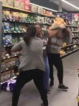 Women fighting over toilet paper rolls in Woolworths Chullora as the coronavirus craziness hits new levels. Picture: Twitter